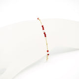 Браслет из красного коралла с золотым напылением и жемчугом