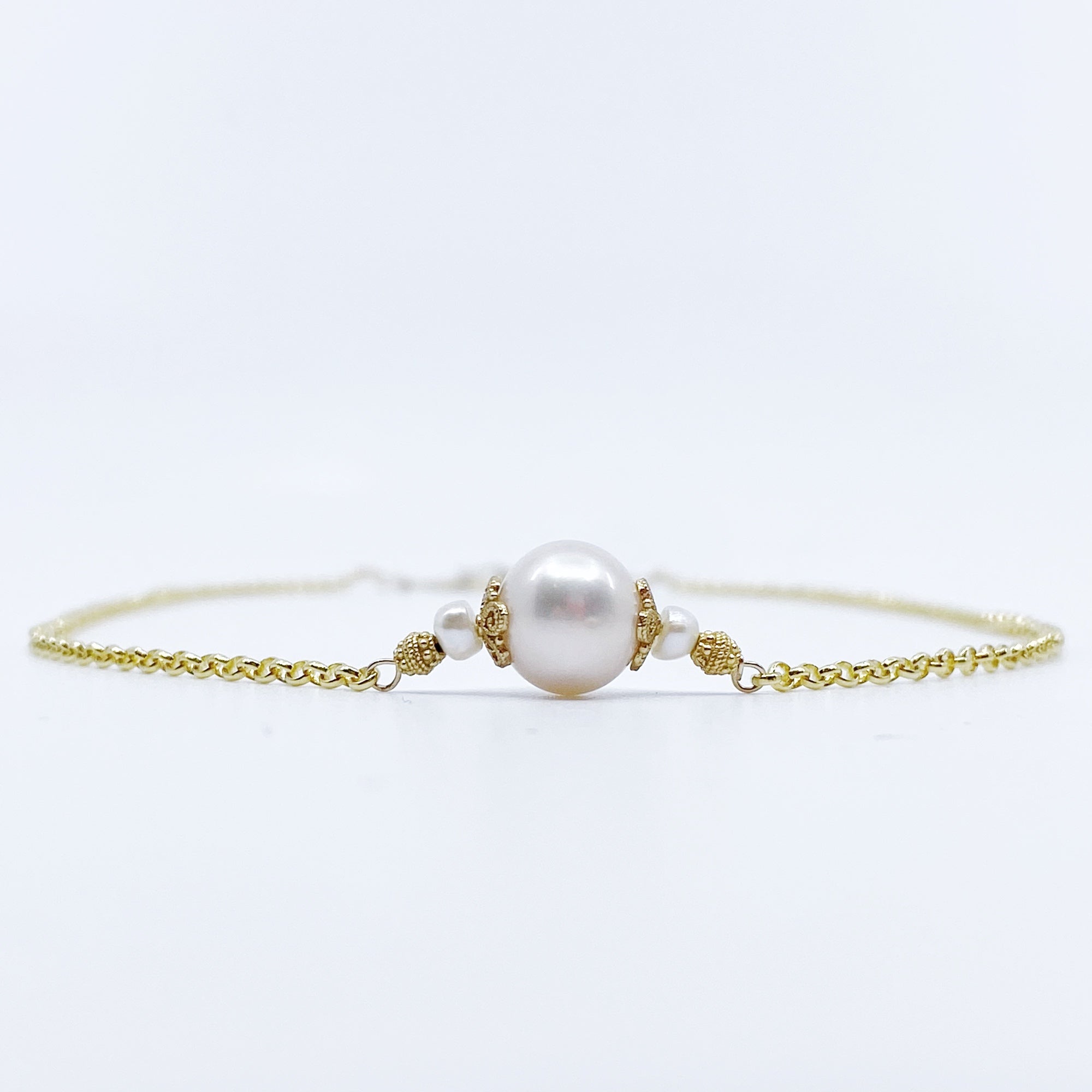 The Nine Gold Pearl Necklace and Earrings Set